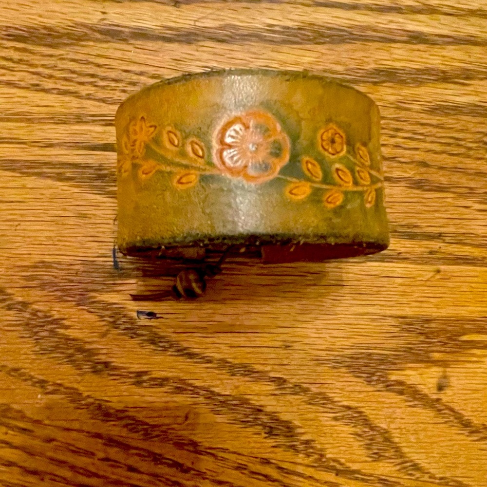 Vintage belt bracelet with tigers eye bead and leather strap.